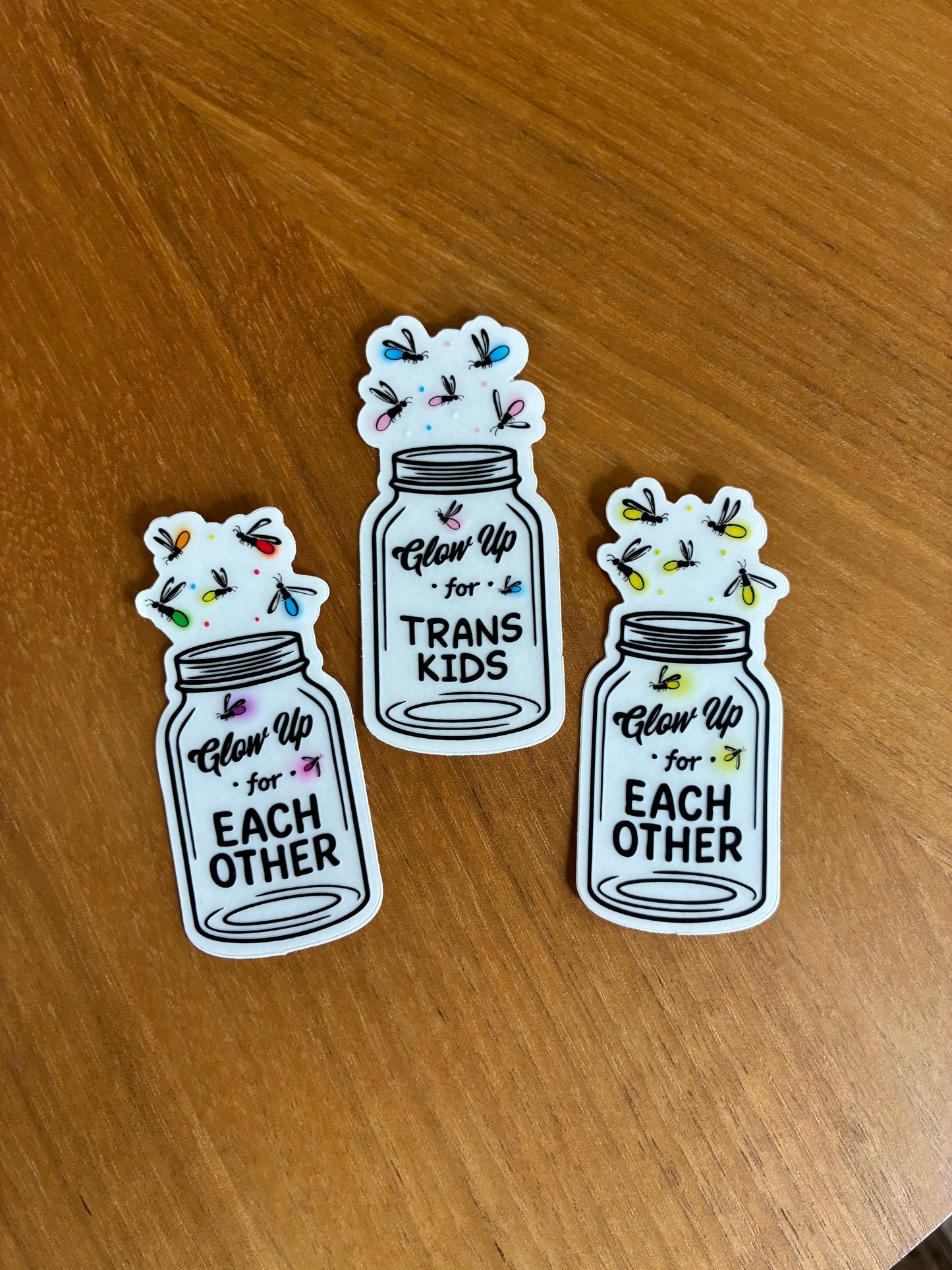 Glow Up For Trans Kids Clear Fire Fly Sticker